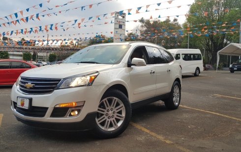 Un carro Chevrolet Traverse 2013 en Coyoacán