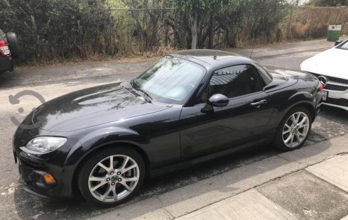 Tengo que vender mi querido Mazda MX-5 2015 en muy buena condición