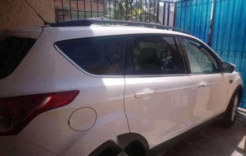 Tengo que vender mi querido Ford Escape 2014 en muy buena condición