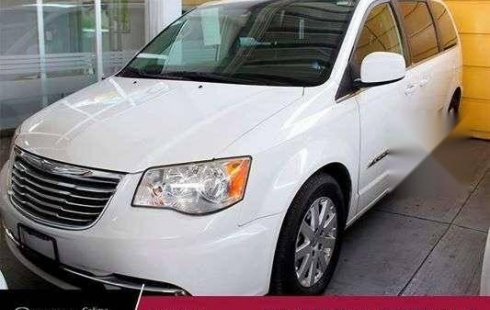 Vendo un carro Chrysler Town & Country 2013 excelente, llámama para verlo