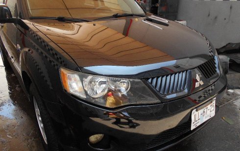 Quiero vender un Mitsubishi Outlander en buena condicción