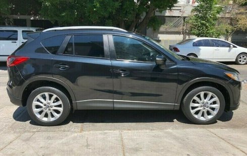Quiero vender inmediatamente mi auto Mazda CX-5 2014 muy bien cuidado