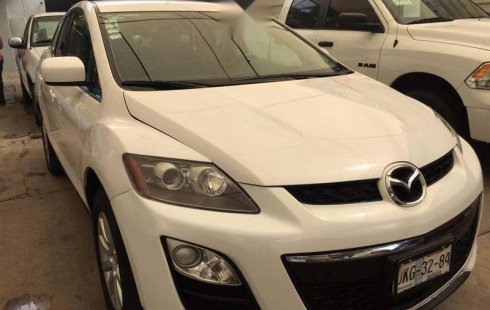 Quiero vender inmediatamente mi auto Mazda CX-7 2013 muy bien cuidado