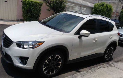 Quiero vender un Mazda CX-5 en buena condicción