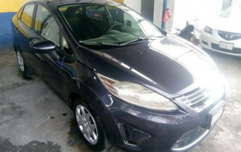 Quiero vender un Ford Fiesta en buena condicción