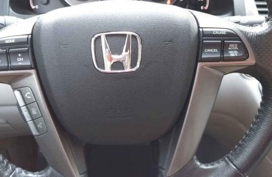 Quiero vender un Honda Odyssey en buena condicción